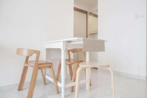Homey and High Floor 2BR at Sky House BSD Apartment By Travelio